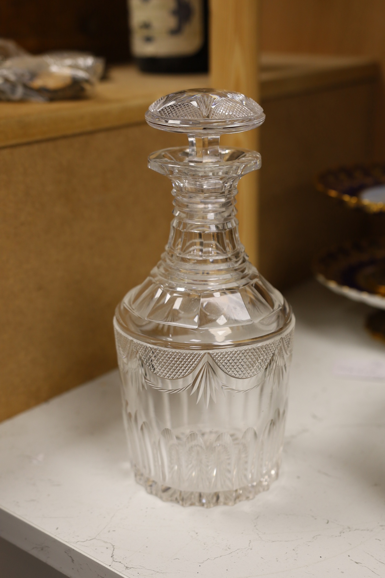 A pair of Regency decanters and stoppers and a pair of gilded glass finger bowls, decanters and stoppers 25.5cm high. Condition - good